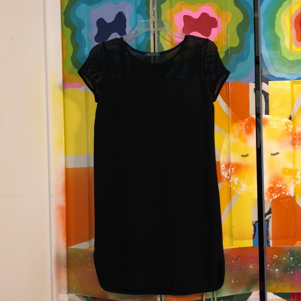 Worn once. Mesh sleeves & neck w/ flowly bottom.
